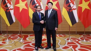 President Luong Cuong and Sultan of Brunei Haji Hassanal Bolkiah at the state banquet held in honour of the Sultan in Ha Noi on December 1. (Photo: VNA)