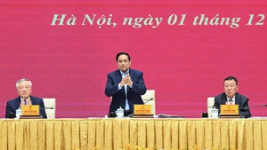 Prime Minister Pham Minh Chinh addresses the conference of the Government Party Committee on December 1. (Photo: NDO)