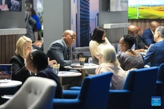 People communicate at the Meetings Africa 2026 in Johannesburg, South Africa, Feb. 24, 2026. The Meetings Africa 2026 opened at the Sandton Convention Centre in Johannesburg on Tuesday. (Photo: Xinhua)