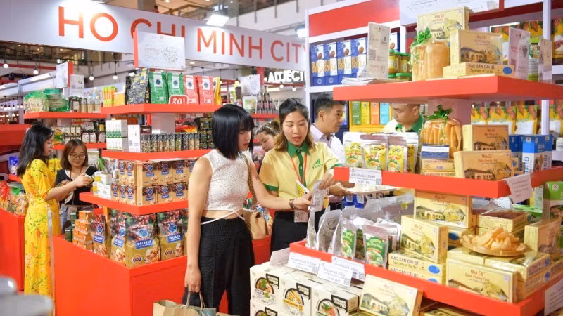 Visitors at a booth during the Viet Nam Week in Bangkok (Thailand)