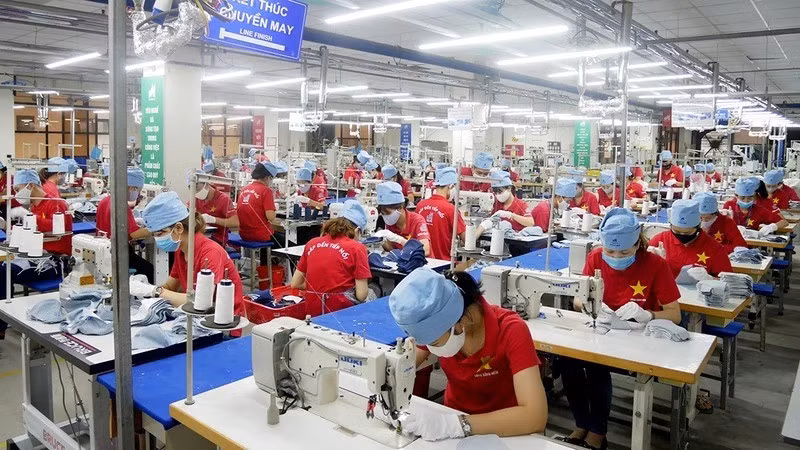 Garment production for export at May 10 Corporation. (Photo: QUYNH CHI)