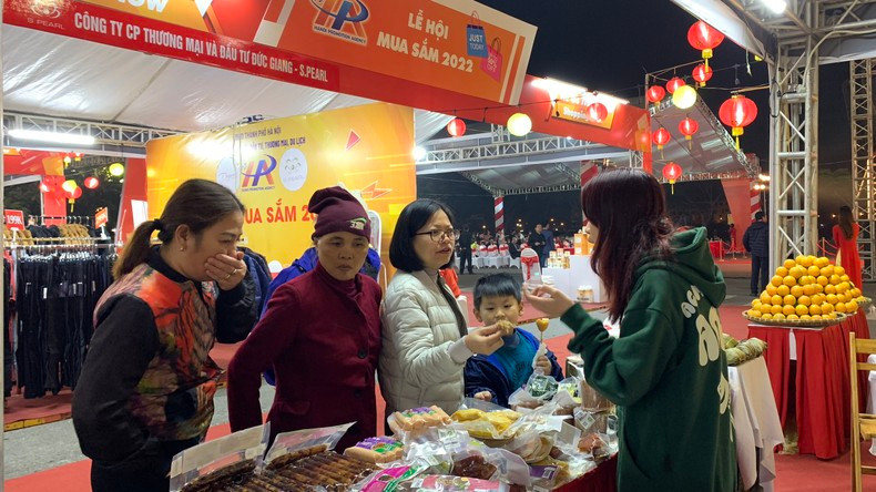 Visitors at display booth.
