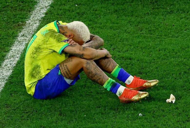 Brazil's Neymar looks dejected after being eliminated from the World Cup. REUTERS/Lee Smith