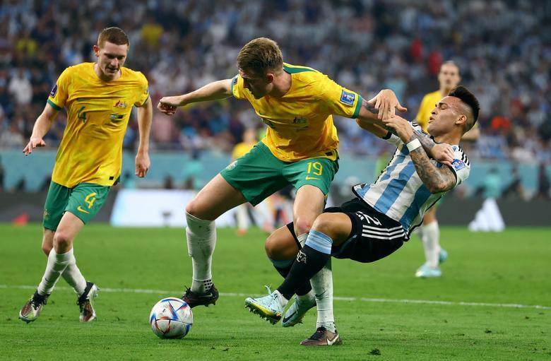 Australia's Harry Souttar in action with Argentina's Lautaro Martinez. REUTERS/Kai Pfaffenbach