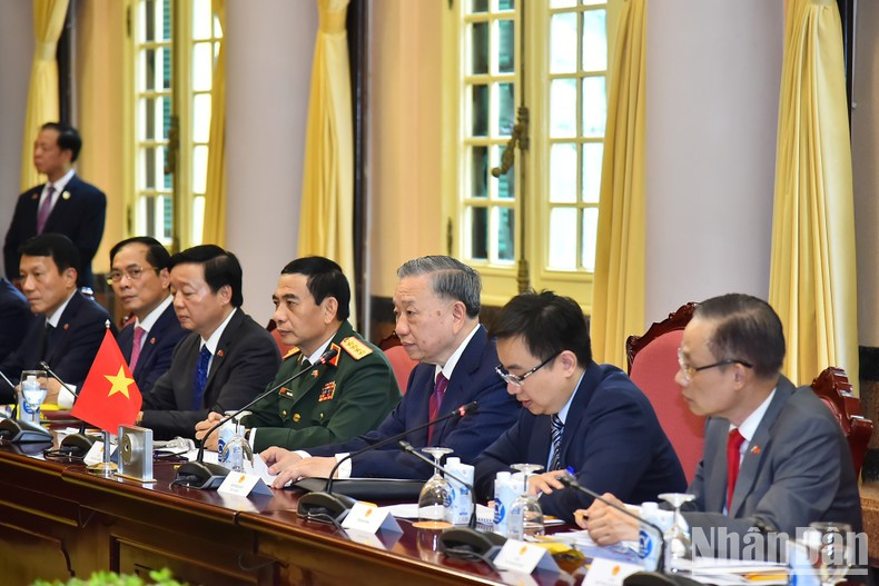 Vietnamese President To Lam speaks during the talks.