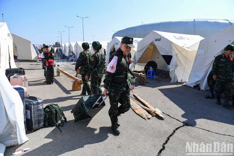 On the final morning in Turkey, the officers pack up their belongings and tents to prepare for the trip home. The cracks left by the earthquake remain at their camping site.