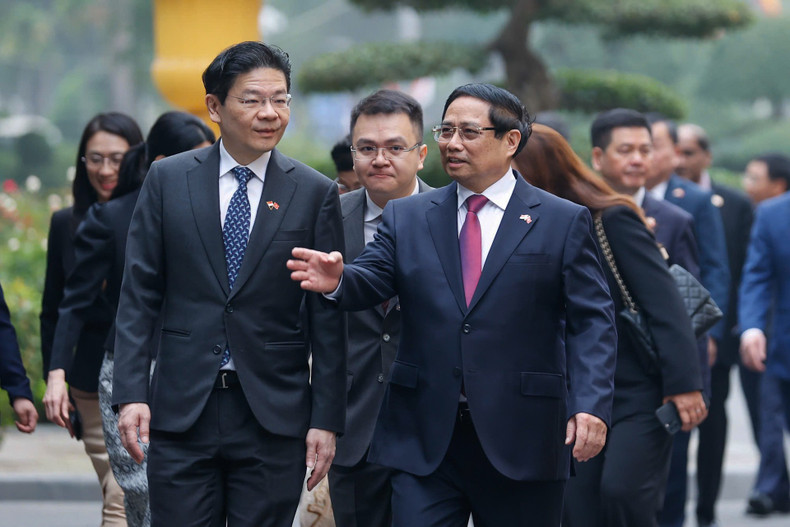 PM Pham Minh Chinh and Singaporean PM Lawrence Wong.
