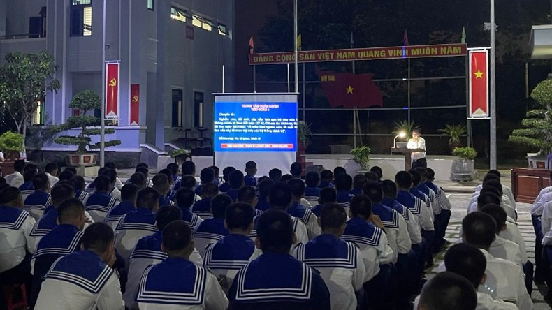 New soldiers attend a communal learning session.