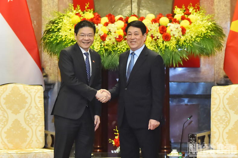 President Luong Cuong and Singaporean PM Lawrence Wong at the reception.