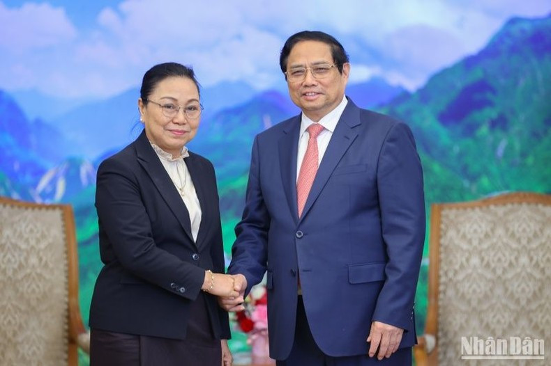 PM Pham Minh Chinh and Lao Ambassador to Vietnam Khamphao Ernthavanh. (Photo: NDO/Tran Hai)