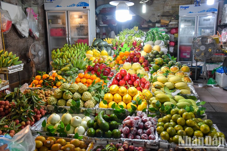 A wide range of colourful fruits is on sale, mainly plums, lychees and sugar apples. A wide range of colourful fruits is on sale, mainly plums, lychees and sugar apples.