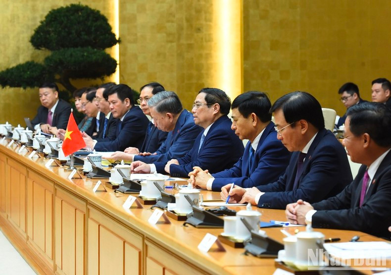 Prime Minister Pham Minh Chinh and members of the Vietnamese government.