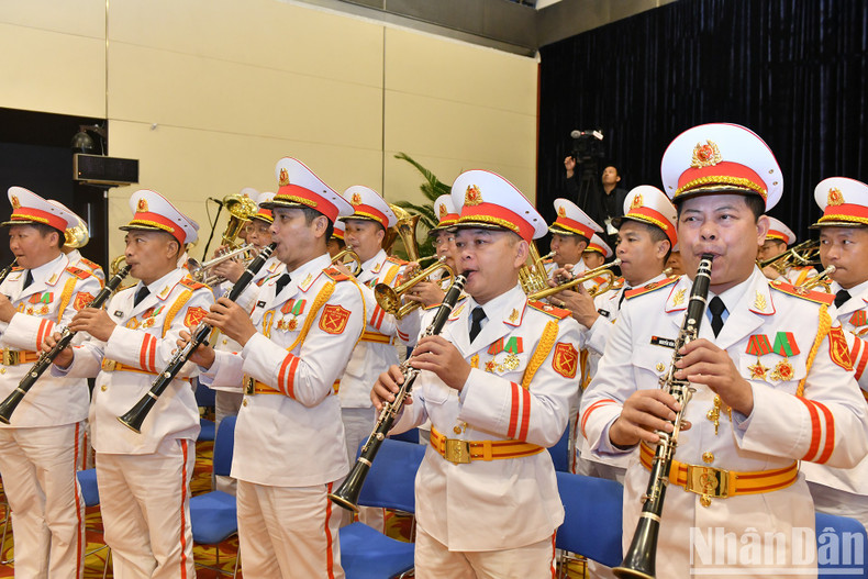 The military band performs at the meeting.