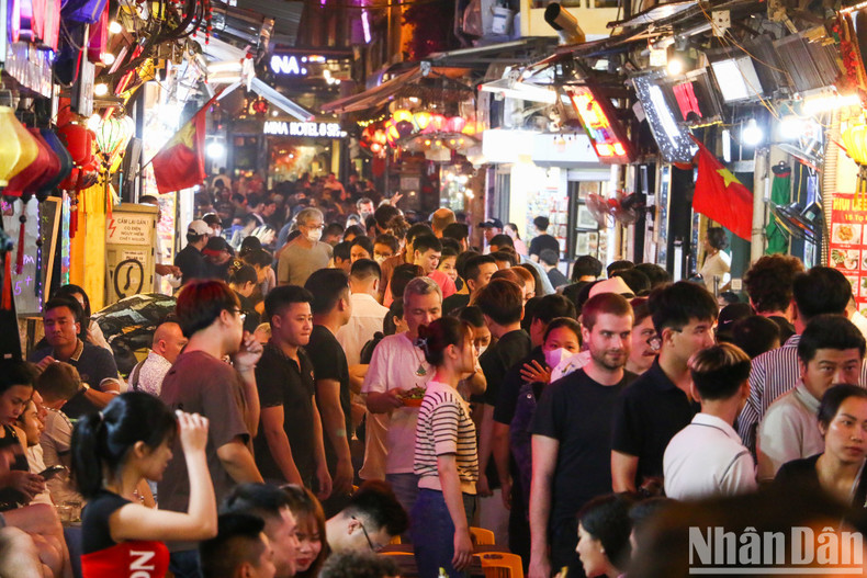 Ta Hien Street crowded with tourists. Ta Hien Street crowded with tourists.