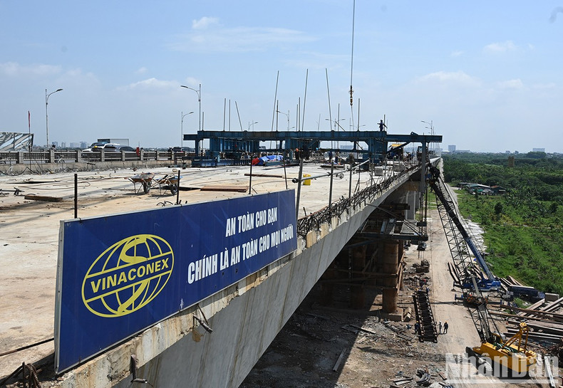 Vinaconex, a contractor, said they are mobilising 100 workers on three shifts so that the final section of the bridge will be completed by June 6.