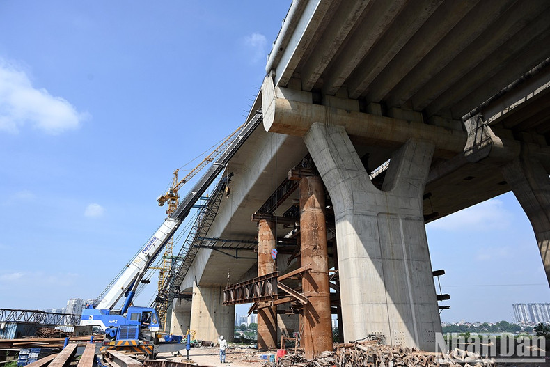 Working on structural connections of the bridge.