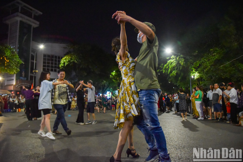 Visitors dance to the tune of classical music. Visitors dance to the tune of classical music.