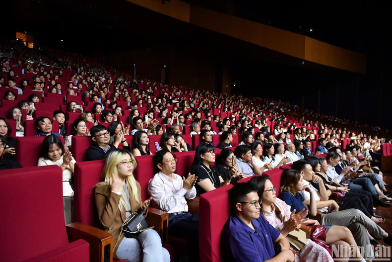 The audience at the National Convention Centre enjoy the performance by Bond. The audience at the National Convention Centre enjoy the performance by Bond.