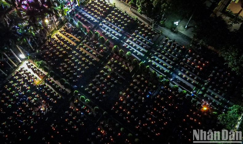 A bird's-eye view of the candlelit vigil at the Hanoi Martyrs Cemetery.