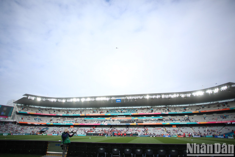 Rows of seats in Eden Park are gradually filled with spectators.