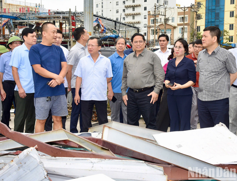PM Pham Minh Chinh inspects the damage caused by Typhoon Yagi in Quang Ninh Province.