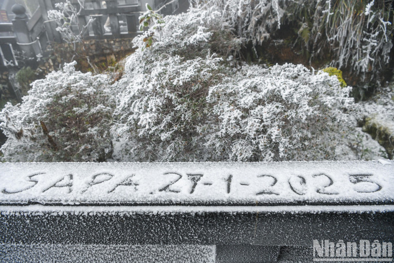Snow covers trees and buildings around the peak. Snow covers trees and buildings around the peak.
