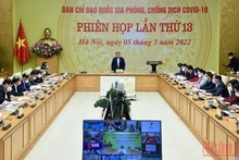 Prime Minister Pham Minh Chinh chairs teleconference between the National Steering Committee for COVID-19 Prevention and Control with ministries, sectors, and 63 provinces and cities (Photo: NDO/Tran Hai)