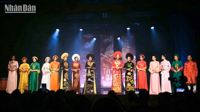 An ao dai performance at the event.