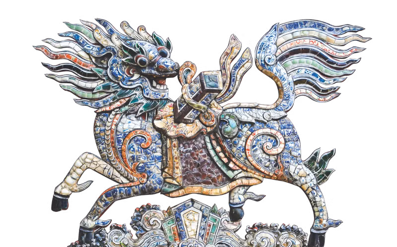 A dragon horse screen wall at Kim Long Communal House, crafted by Hue artisans using ceramic and porcelain mosaic techniques.