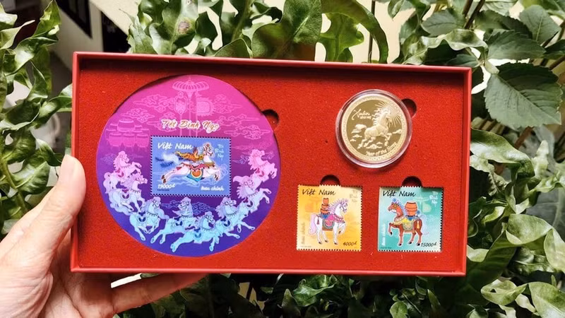 The horse-themed stamp set and commemorative coin.
