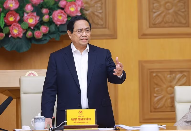 Prime Minister Pham Minh Chinh speaks at the meeting. (Photo: VNA) 