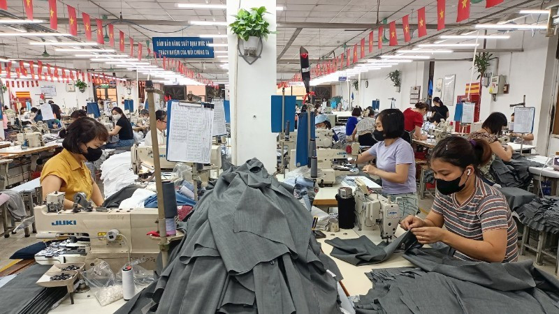 Manufacturing clothes for export at Garco 10.