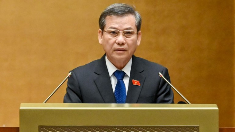Chief Justice Le Minh Tri reports on the performance of the Supreme People's Court during 2021–2026 on October 20, 2025. (Photo: Duy Linh)