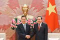 National Assembly President Tran Thanh Man (right) receives Chairman of the Financial and Economic Affairs Committee of the National People’s Congress of China (NPC) Zhong Shan in Ha Noi on September 16. (Photo: Duy Linh)