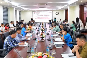 Delegates at the seminar. (Photo: nhandan.vn)
