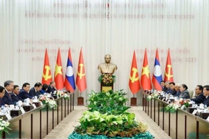 General Secretary To Lam and General Secretary and President of Laos Thongloun Sisoulith co-chaired the high-level meeting between the CPV and the LPRP. (Photo: Thong Nhat/VNA)