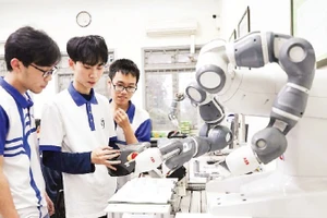 Students in a laboratory at the University of Technology under the Viet Nam National University, Ha Noi.