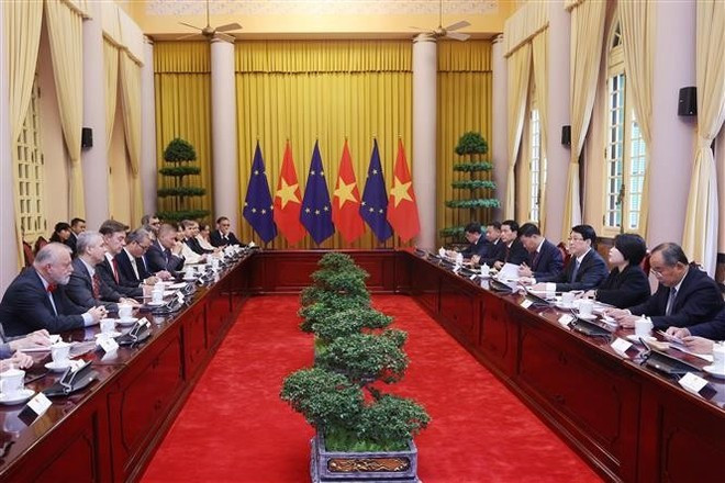 The meeting in Hanoi on June 9 (Photo: VNA) 9-6-2vna-etnam-eu-relation-state-president-luong-cuong-eu-ambassador-julien-guerrier.jpg