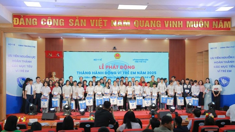 Children receive gifts at the event. 1-6-child2.jpg