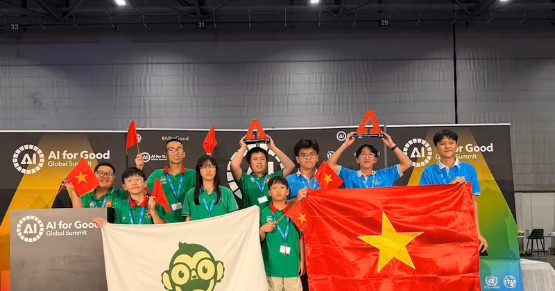 Viet Nam's HMD and Mission Possible teams celebrate their runner-up awards at the competition.