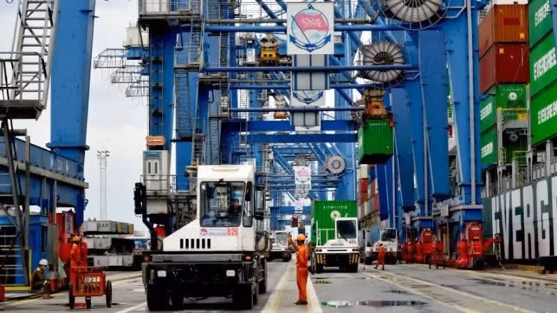 Workers at Saigon Port.