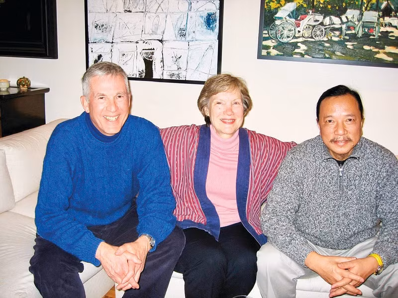 Painter Pham Luan (right) with John and Judy, in 2006.