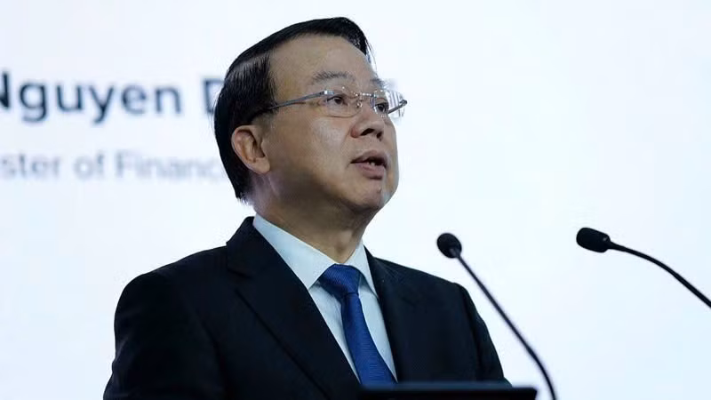 Deputy Minister of Finance Nguyen Duc Chi addresses the conference. (Photo: ANH VU)