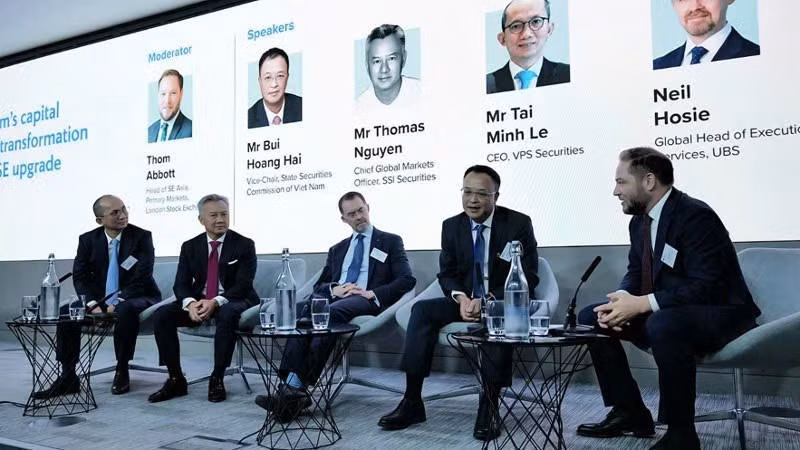 A panel discussion at the conference. (Photo: ANH VU)