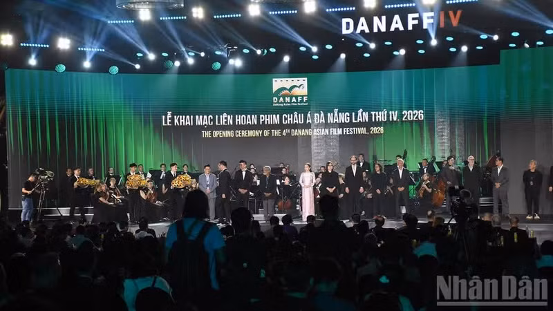 Members of the festival jury receive flowers from the organising committee.
