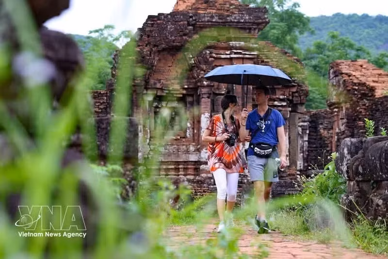 International visitors admire the beauty of the My Son Cham sanctuary in Duy Xuyen, Da Nang. (Photo: VNA)