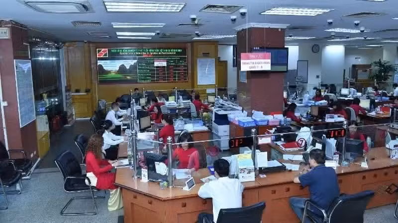 Customers conduct transactions at Agribank.