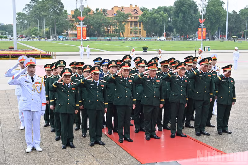 The delegation of the Central Military Commission–Ministry of National Defence respectfully commemorates President Ho Chi Minh.