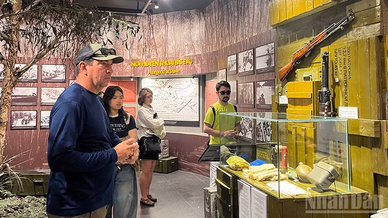 Foreign tourists visit the War Remnants Museum.