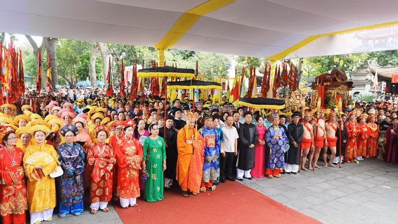 Delegates and visitors attend the festival.